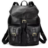 The Vintage Leather Backpack, crafted from premium cowhide leather, comes with adjustable straps and is secured by a flap closure featuring a buckle and drawstring. This fashionable travel accessory also includes two front pockets with buckle closures and gold-tone hardware accents.