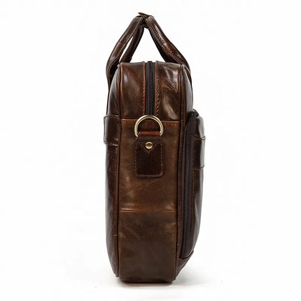 A side view of the Leather 16" Briefcase made from genuine cow leather, featuring two handles on top, a brass ring attachment, and multiple compartments including a zipper pocket. The bag, with an adjustable strap for convenience, stands upright against a white background.
