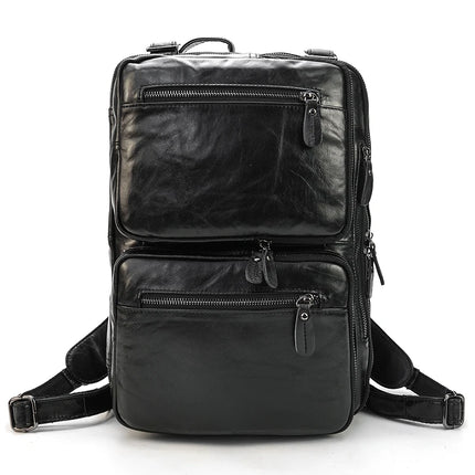 Introducing the Leather Travel Backpack Shoulder Bag, a sleek and sophisticated black leather backpack crafted from genuine cowhide leather. This luxurious accessory showcases multiple zippered compartments, including three front zip pockets and two side pockets, along with adjustable shoulder straps for added comfort. Its ample storage and stylish design make it ideal for various uses, epitomizing true luxury in a backpack.