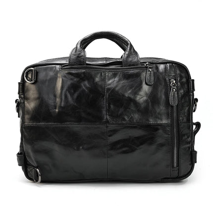 The Leather Travel Backpack Shoulder Bag features a sophisticated black quilted pattern, dual handles, and multiple zippered compartments. Crafted from genuine cowhide leather, this sleek and refined backpack boasts metal hardware and adjustable side straps. It's not just a luxury accessory; it's an emblem of refined taste.