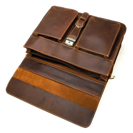 Introducing the Leather 16" Business Briefcase: crafted from genuine cowhide leather, this elegant briefcase offers multiple compartments and pockets. It boasts a lighter brown suede material lining inside, and is finished with a sleek metal latch closure at the top.
