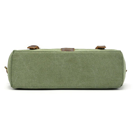 The Canvas & Leather Vintage Messenger Bag is a rectangular green canvas bag with business style, brown genuine leather accents, and a structured shape reminiscent of classic briefcases, revealed from the bottom view.