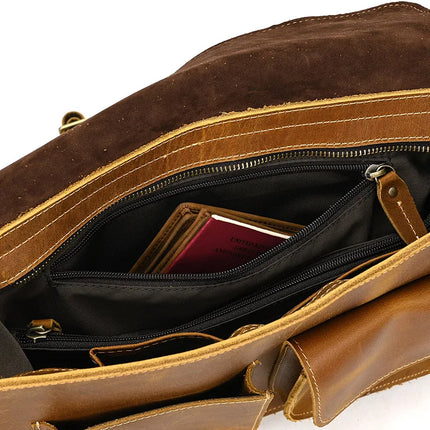 A Leather Business Travel Shoulder Bag with its top zippered compartment open, revealing a maroon-colored passport and a wallet inside. Crafted from genuine cowhide leather, this bag features multiple compartments and high-quality alloy hardware, with visible stitching on its brown and tan exterior.