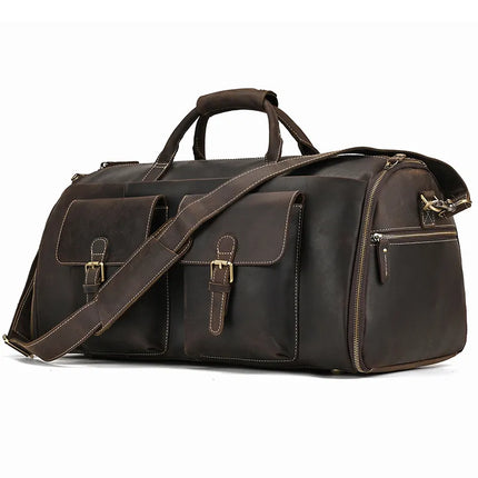 The Weekender 22 Leather Travel Duffle Bag is showcased, boasting a large, genuine cowhide leather design with two front pockets featuring buckle closures, a zipped side pocket, and sturdy handles. The bag also includes an adjustable shoulder strap, a shoe compartment for added convenience, and prominent white stitching along the edges.