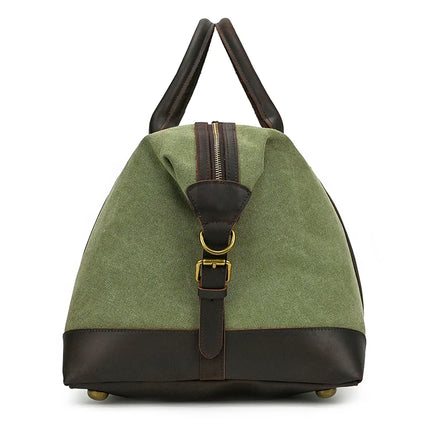The Canvas & Leather Travel Duffle is a green and brown canvas bag with a genuine leather handle and base, featuring a vintage design. It includes a zipper closure, strap with metal buckle at the front, and four gold-colored feet for stability on the bottom.