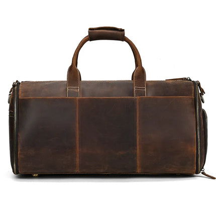 The Luggage 22 Leather Travel Duffle Bag is a large brown genuine leather travel duffle featuring two sturdy handles with a padded cover. This rustic, vintage design boasts visible stitching and multiple side pockets. The distressed, worn look of the leather enhances its rugged style, and it comes with the convenience of a removable strap for easy carrying.