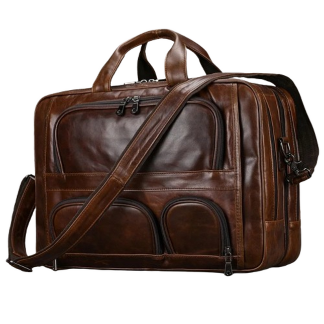 The Leather 17" Business Travel Briefcase is crafted from genuine leather and boasts dual handles along with an adjustable shoulder strap. It includes multiple zippered compartments, mainly situated on the front and sides, offering generous space for documents, essentials, and a laptop. Ideal for business travel, its polished leather finish exudes sophistication.